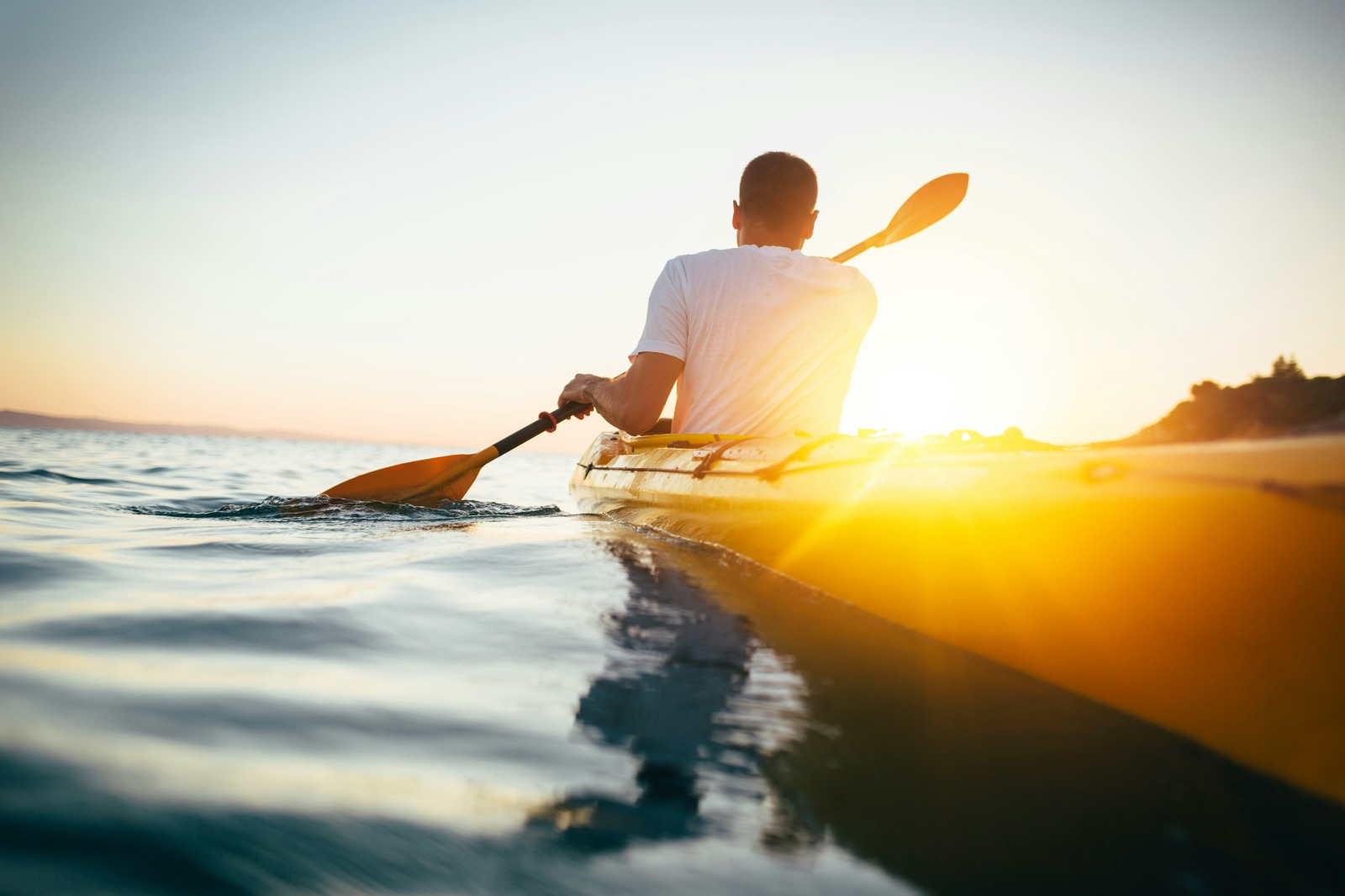 Paddling into the sun